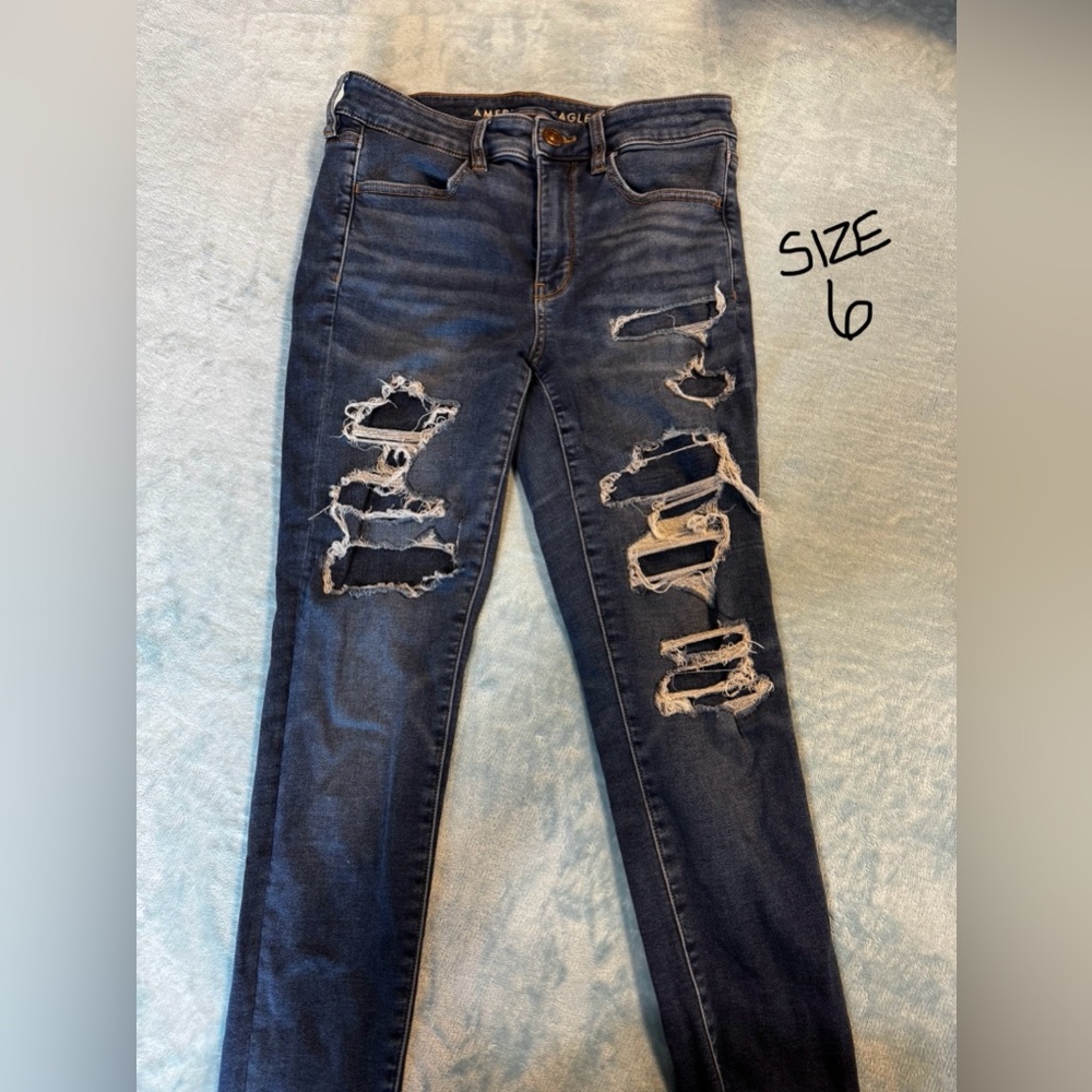 American Eagle Women's Distressed Blue and Black Jeans